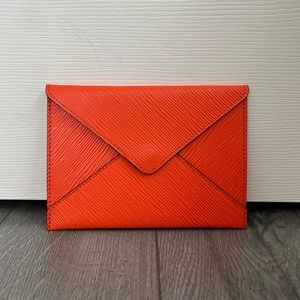 AUTHENTIC LOUIS VUITTON
Epi Envelope Pouch Orange